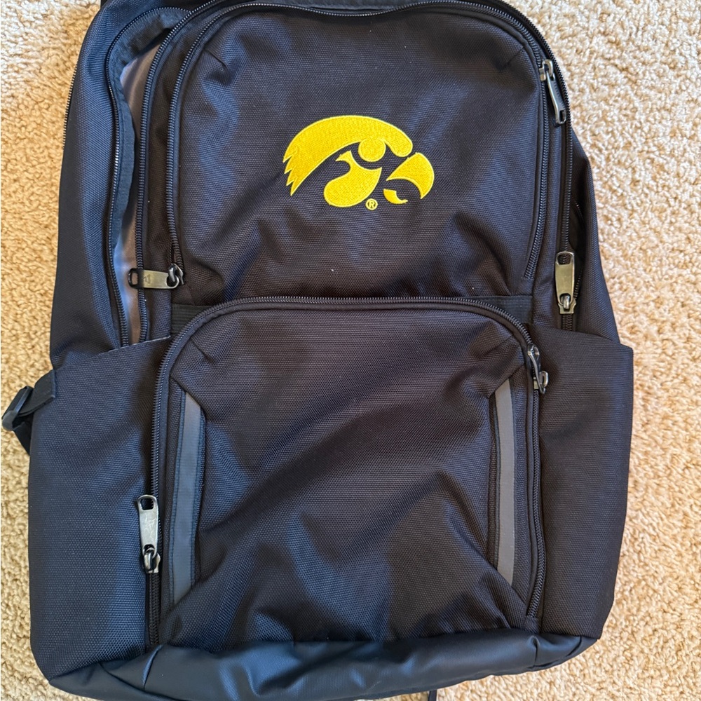 Black Backpack With Yellow Logo - image 1